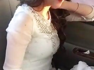 Pakistani stunner teen alongside car